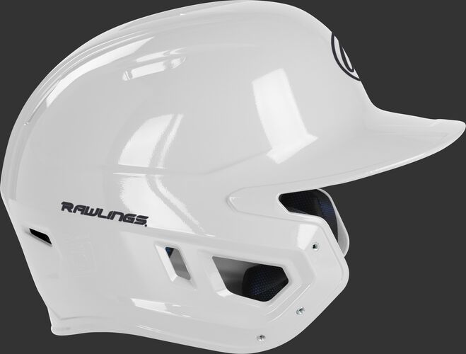 Right side of a MCH01A Rawlings Mach helmet with a white shell and compatible with a MEXT face guard extension