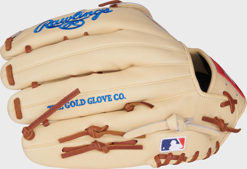 Camel back of a Heart of the Hide 12.75" outfield glove with the MLB logo on the pinky