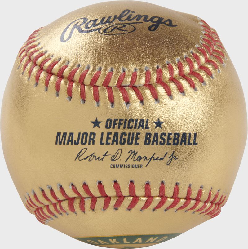 An Oakland Athletics Rawlings Gold MLB team baseball with the official ball MLB stamp - SKU: RSGEA-GOLDOAK-R