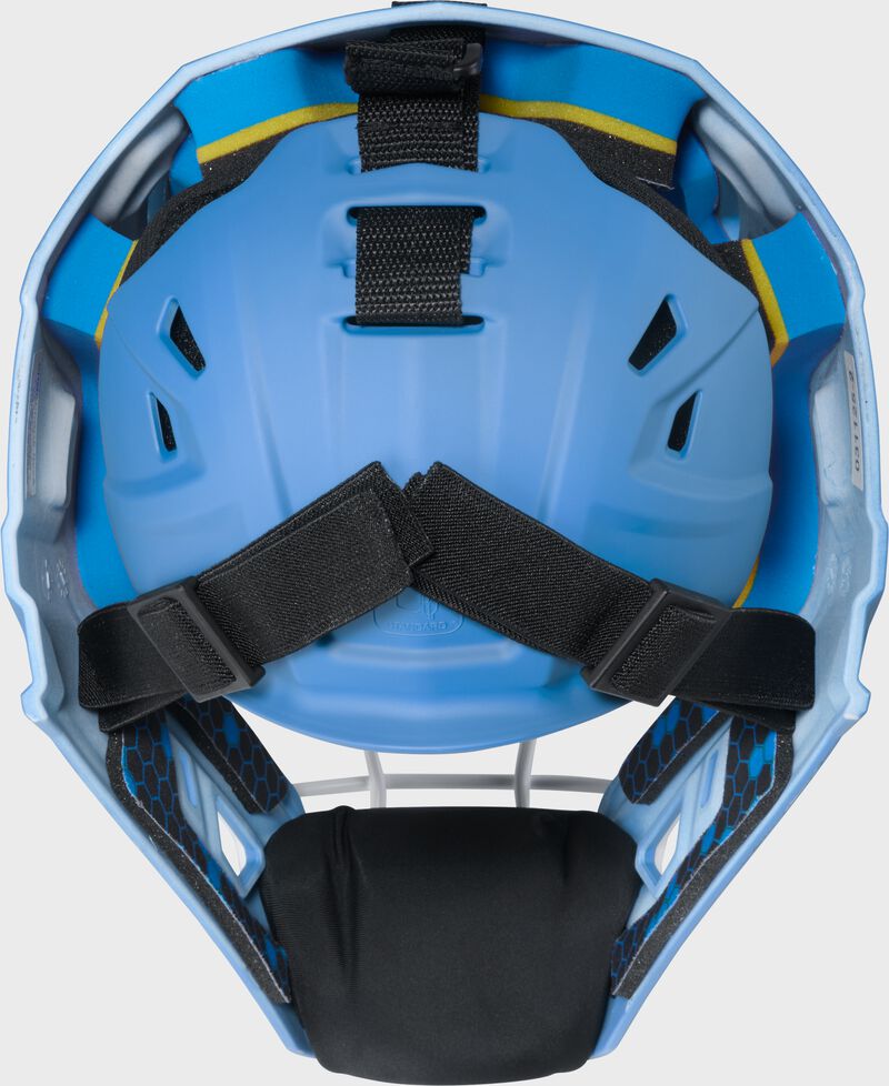 Back of a Columbia blue Rawlings Mach Pro Series catcher's helmet loading=