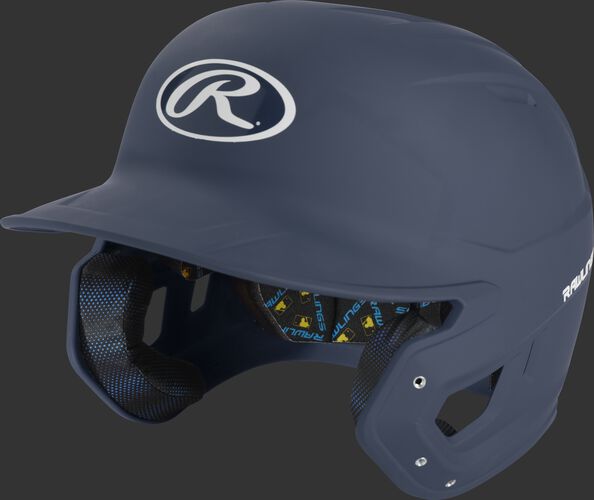 Left angle view of a matte navy MCH07A Mach high school/college batting helmet