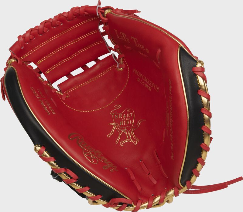 Scarlet palm of a Rawlings Heart of the Hide R2G catcher's mitt with gold stamping and scarlet laces - SKU: PRORCM325US