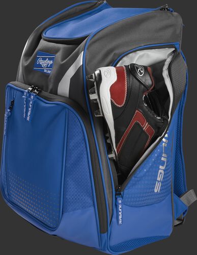 A cleat in the side cleat pocket of a royal Legion baseball backpack - SKU: LEGION-R