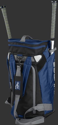 Left angle of a navy R601 Rawlings Hybrid players bag with two bats