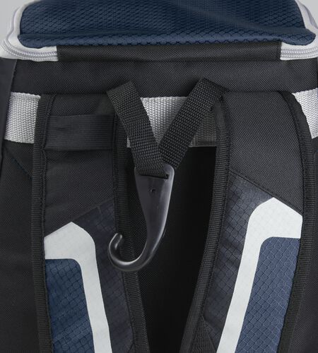 Exterior handle on the back of a black/navy R500 backpack with a hook for hanging it up