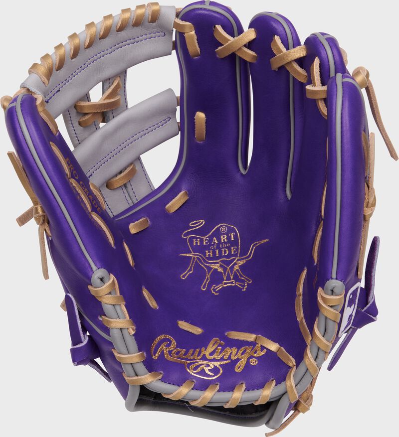 Purple palm of a Rawlings Heart of the Hide infield glove with gold laces and gold stamping