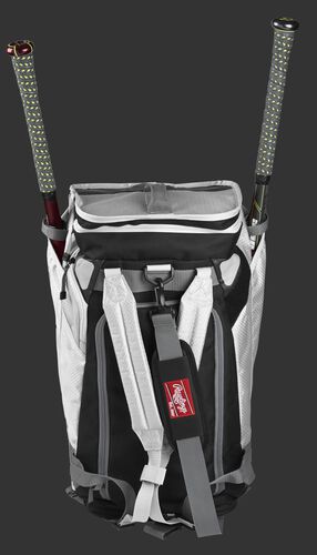 A white R601 Rawlings Hybrid duffel/backpack standing up with two bats