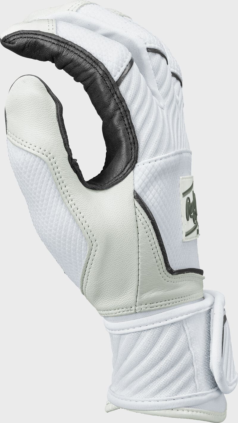 Thumb of a white Women's Workhorse OKC compression strap fastpitch batting glove