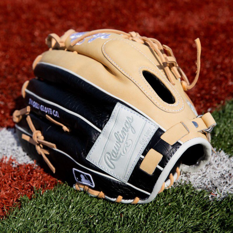 Back wrist of a ColorSync 8.0 Heart of the Hide outfield glove on a field