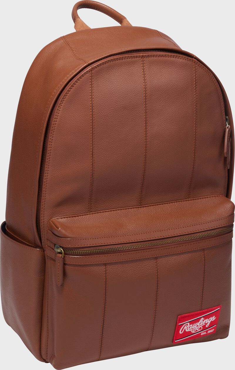 Front angle view of a tan Rawlings Strike Out backpack