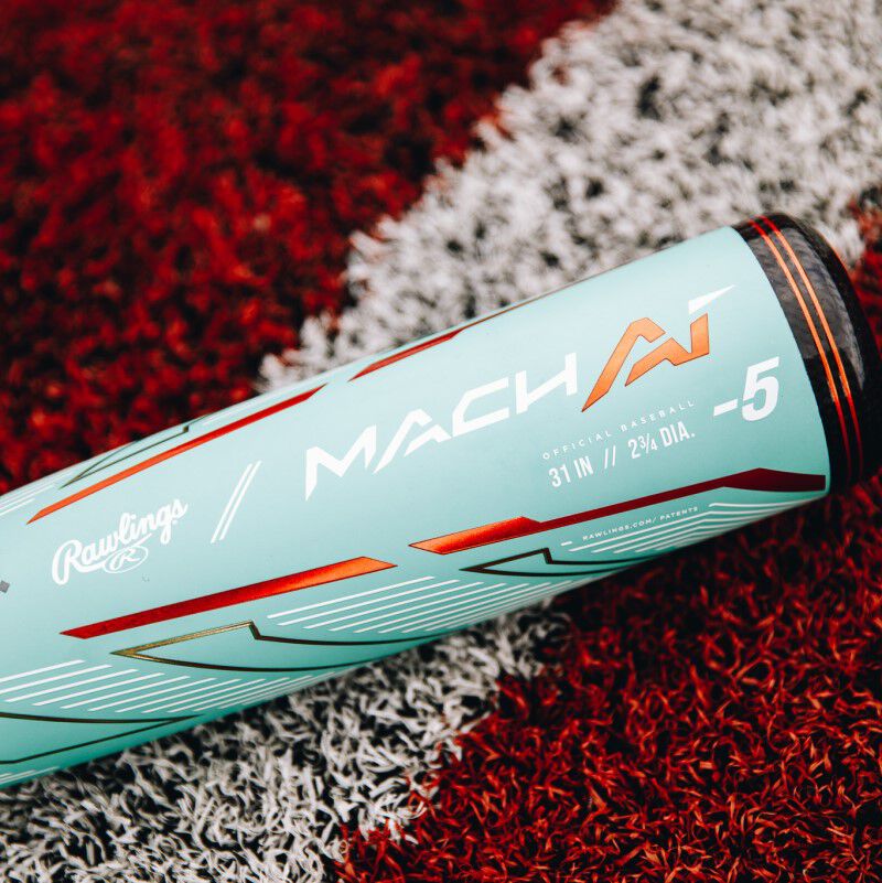 Barrel of an Ocean Mint Mach AI USSSA bat laying a field - SKU: RUT4MC