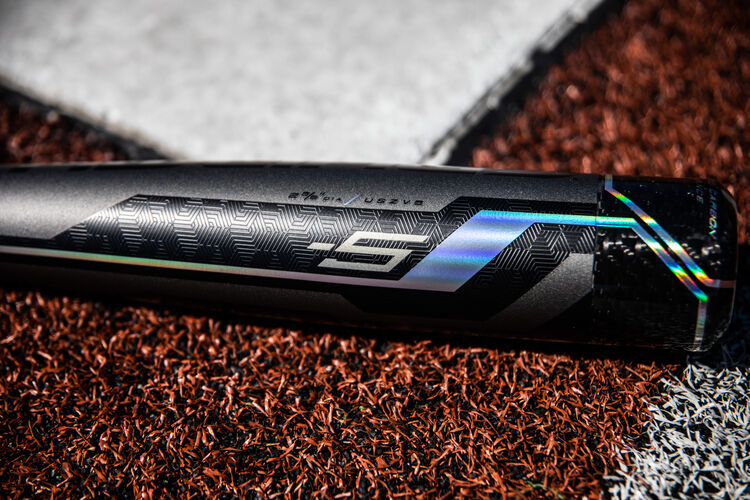 A -5 Velo ACP bat lying next to home plate - SKU: USZV5