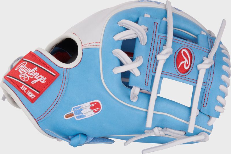 Thumb of Columbia blue/white/scarlet exclusive Heart of the Hide R2G 11.5" infield glove with a popsicle emboridered on the thumb - SKU: PROR314-2CBW