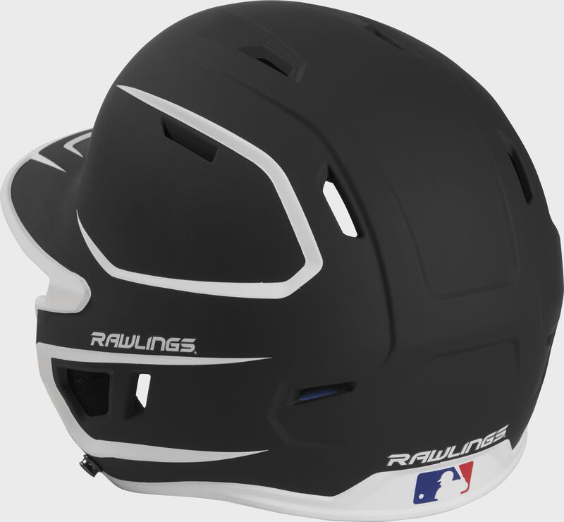 Back left view of a matte black/white MACHEXTR MACH series two-tone batting helmet with air vents