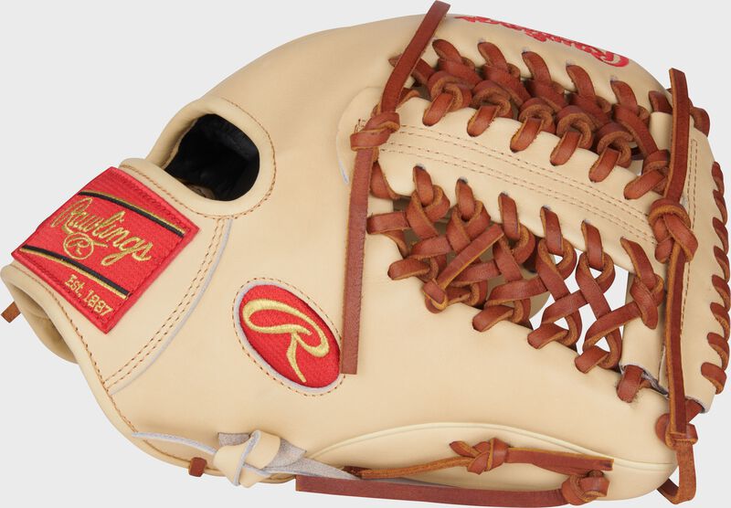 Thumb of a camel Heart of the Hide 11.75" infield/pitcher's glove with a Modified Trap-Eze web