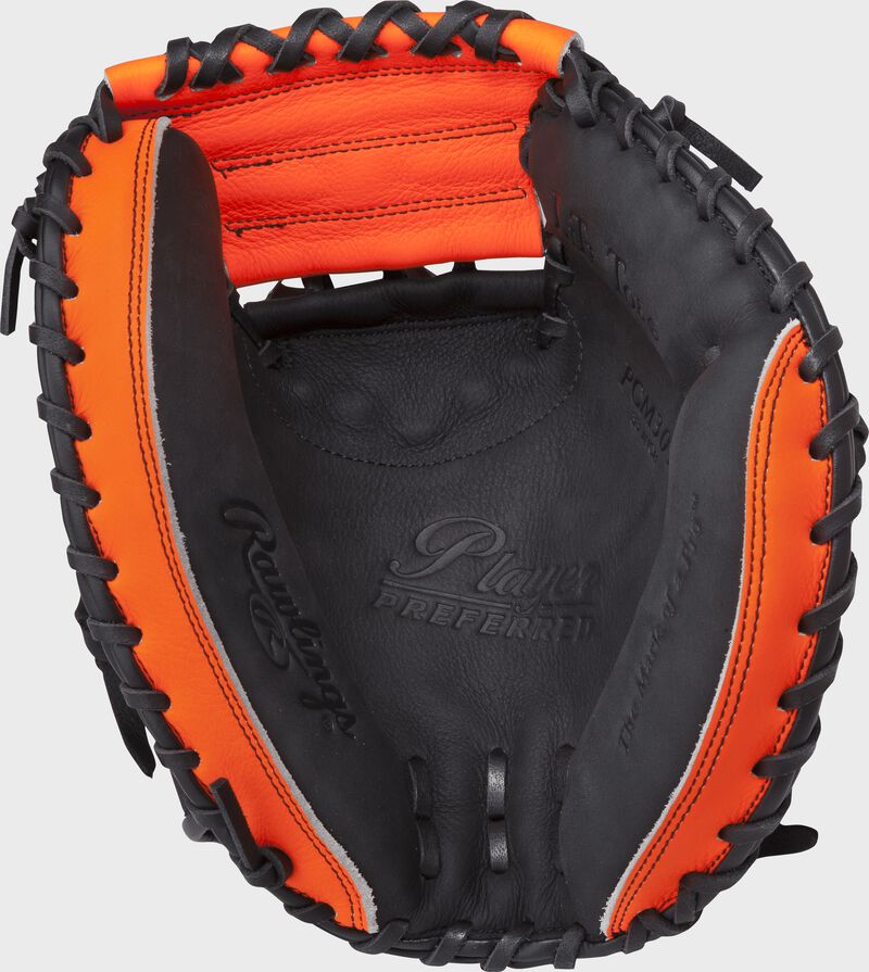 Palm view of a PCM30T Rawlings recreational baseball/softball catcher's mitt with a black palm, orange trim and black laces
