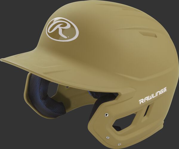 Left angle view of a Rawlings MACH helmet with a one-tone matte Vegas gold shell