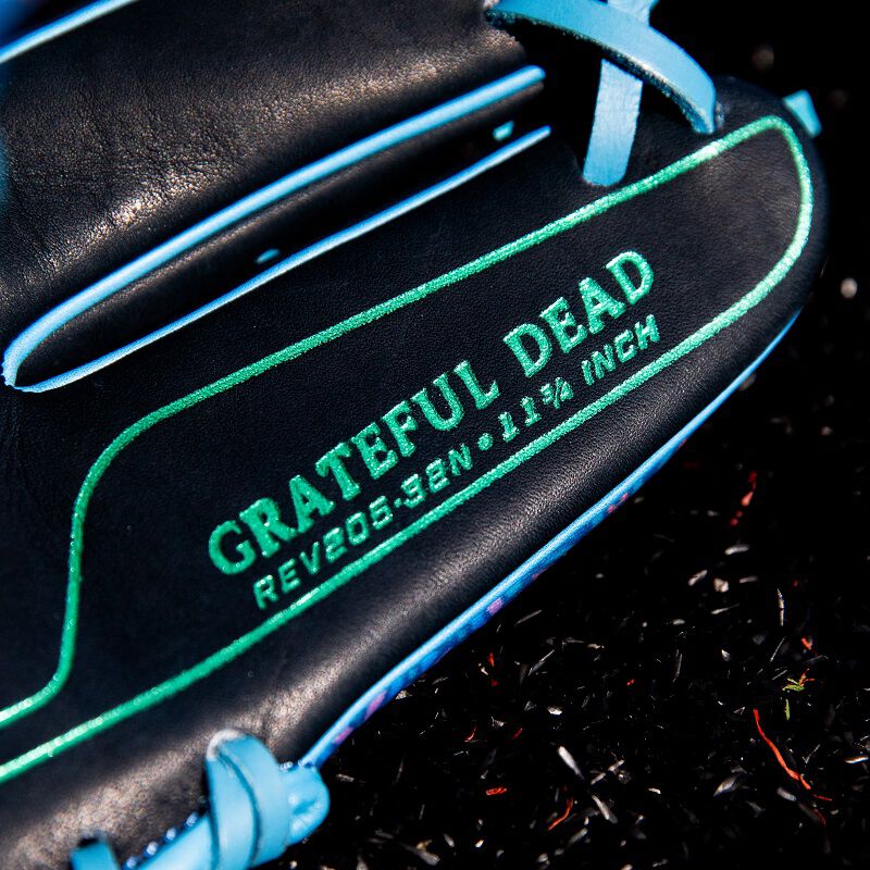 A mint green "Grateful Dead" stamp on the pinky of a Rawlings Grateful Dead REV1X glove