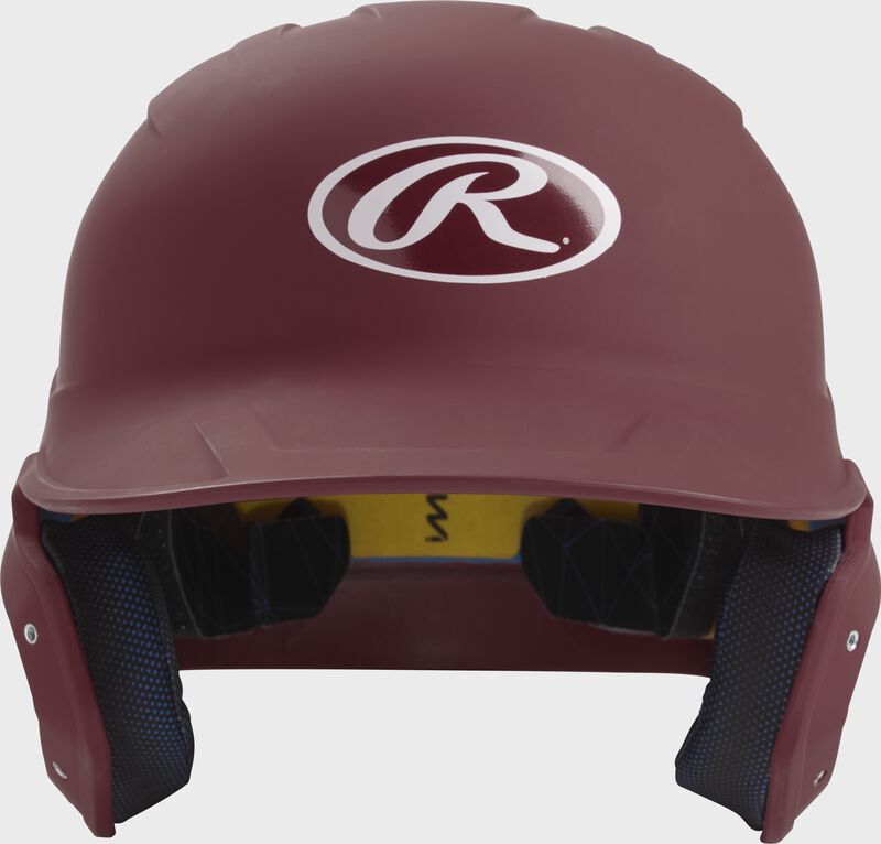 Front of a matte maroon MACH junior size batting helmet
