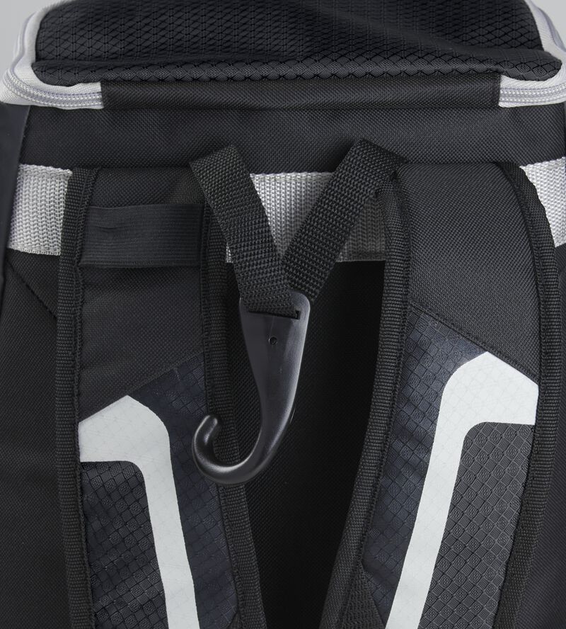 Exterior handle on the back of a black R500 backpack with a hook for hanging it up