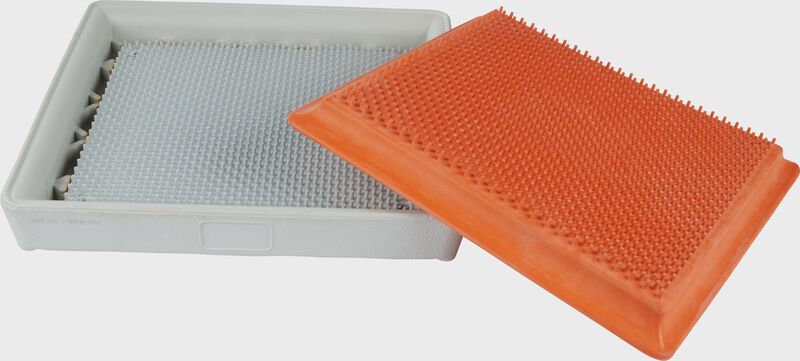 The white & orange separate pieces of a Rawlings Hollywood Impact Kwik-Release base - SKU: HIKRB