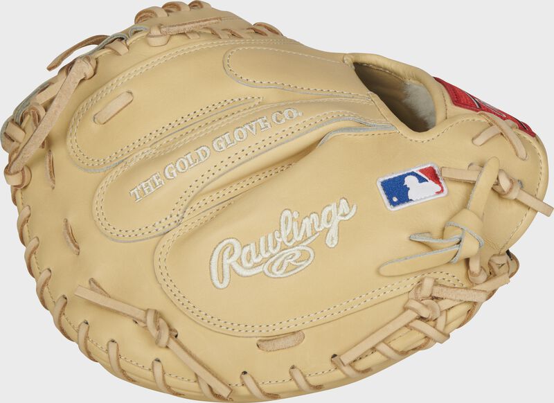 Side of a Pro Preferred camel catcher's mitt with the MLB logo on the wrist - SKU: PROSCM43C