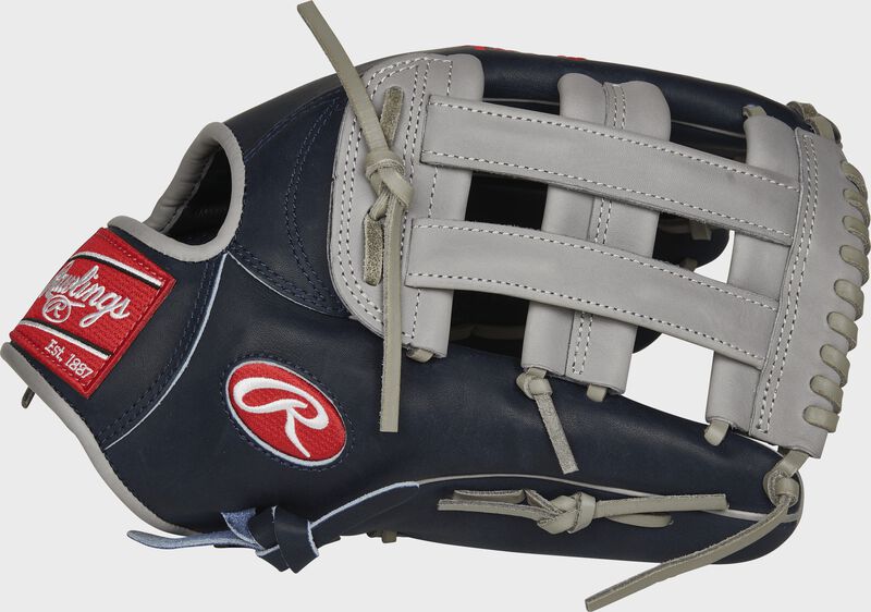 Thumb view of a navy PROSAJ99 Aaron Judge Pro Preferred 13-inch outfield glove with a grey H web loading=