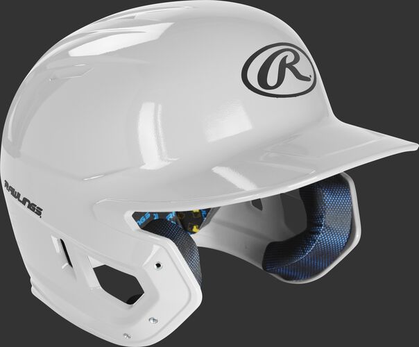 Right angle view of a MCH01A Rawlings Mach helmet with a white shell