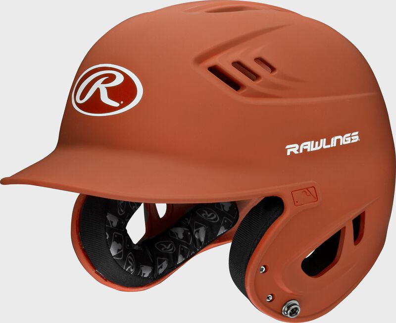 A burnt orange R16M Velo batting helmet with Cool-Flo vents