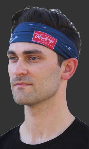 A guy wearing a gray stitch multi-functional neck gaiter as a head band - SKU: RC40001-400