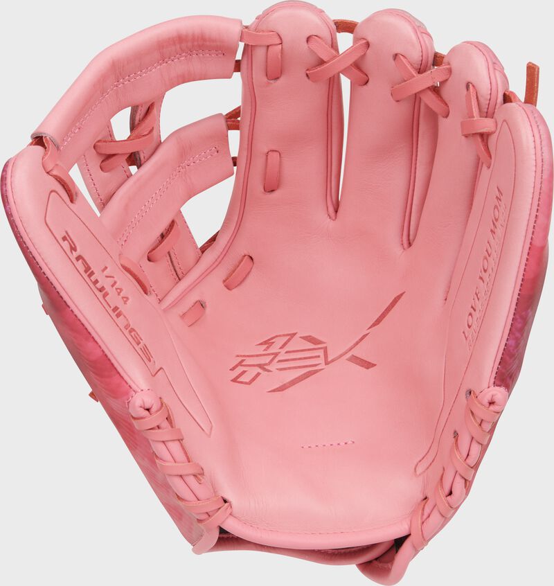Pink leather palm of a Rawlings REV1X infield glove - SKU: REV205-32P