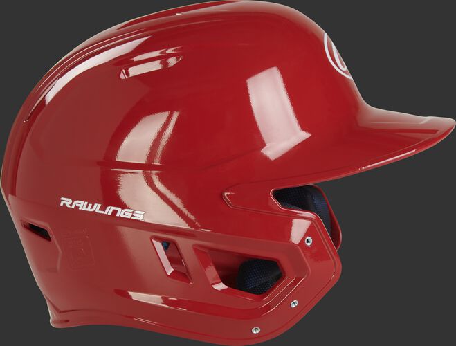 Right side of a MCC01A Rawlings Mach gloss helmet with a scarlet shell and compatible with a MEXT face guard extension