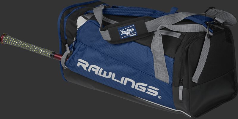Side angle view of a navy R601 Hybrid players duffel bag with a bat in the side sleeve