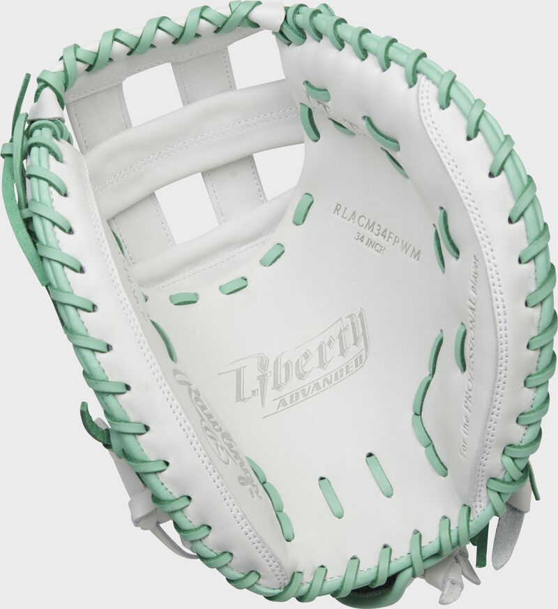 White palm of a Rawlings Liberty Advanced Color Series catcher's mitt with mint laces - SKU: RLACM34FPWM