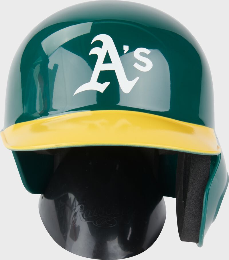 Front of a green/yellow Oakland A's mini replica helmet 
