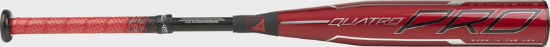Barrel of a red USZQ12 Rawlings Quatro Pro USA youth bat with a red barrel, red/black grip and silver accents