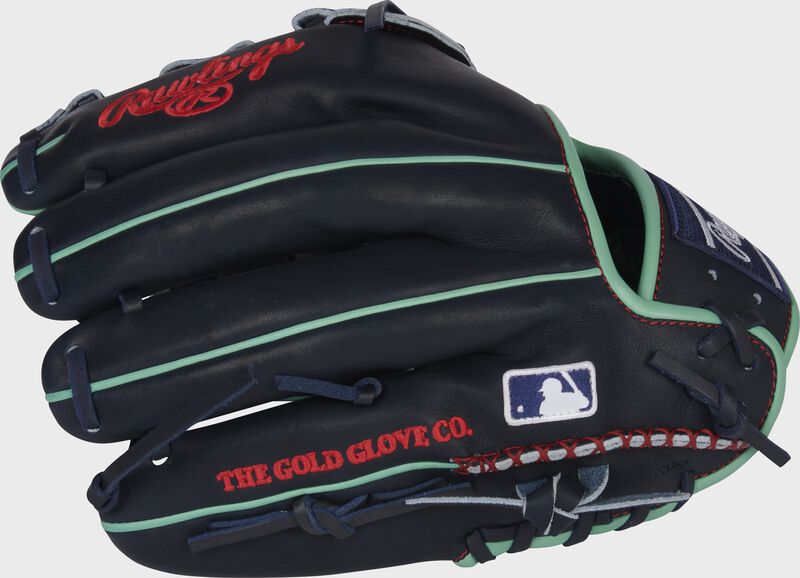 Back of a navy HOH ColorSync 6.0 H-web glove with hand-sewn welting and MLB logo on the pinky - SKU: PRONA28NM