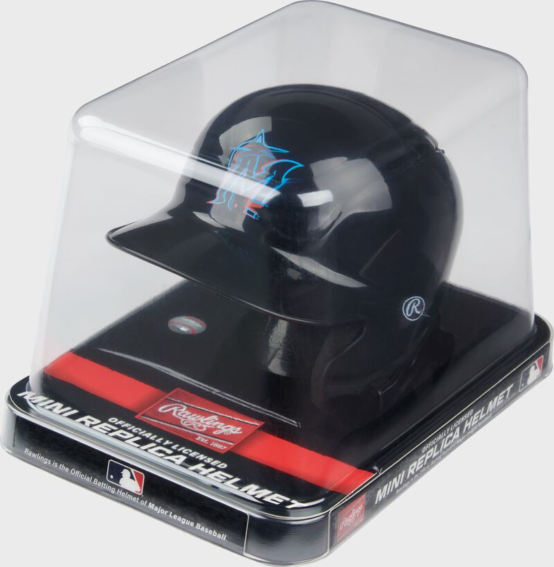 A black Marlins mini helmet in a clear packaging case
