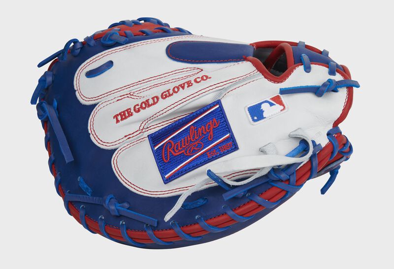 White finger backs of a HOH catcher's mitt with a royal Rawlings patch and MLB logo - SKU: PROCM41SWR
