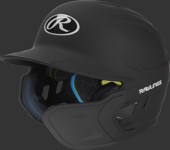 Left angle view of a matte black MACHEXTR Mach Junior helmet with Mach EXT right hand batter face guard extension