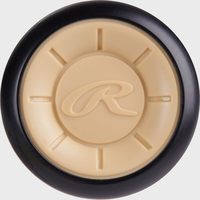 Tan end cap of a Rawlings Icon USA Baseball -10 bat with a "R" logo in the middle