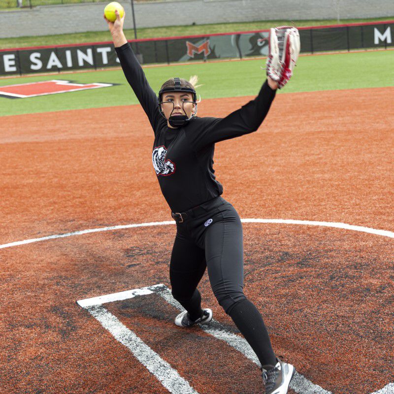 A pitcher throwing a pitch wearing a black Hi-Viz fielder's mask - SKU: RSBFMV