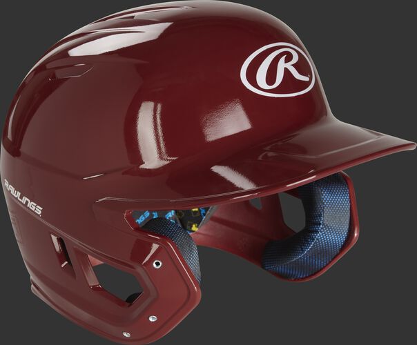 Right angle of a MCH01A high school Mach baseball helmet with a cardinal red shell