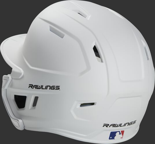 Back left view of a matte white MACHEXTR MACH series batting helmet with air vents