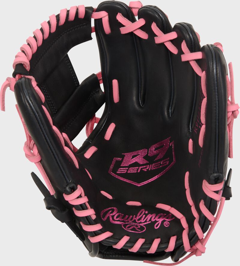 Black palm of a Rawlings R9 ContoUR 11.25-Inch Infield Glove with pink stamping and laces