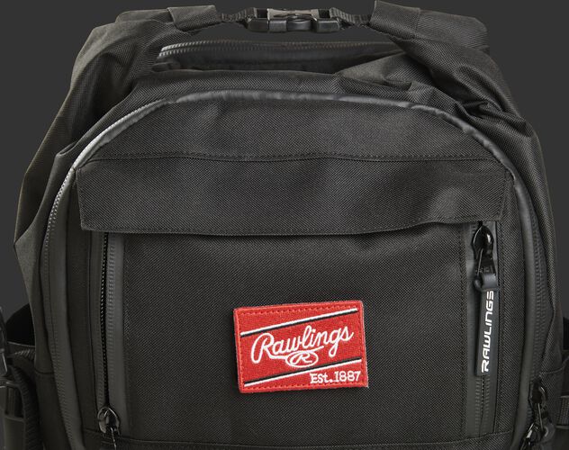 Top front of a black CEO backpack with a Red Rawlings patch and the clips on top - SKU: CEOBP-B