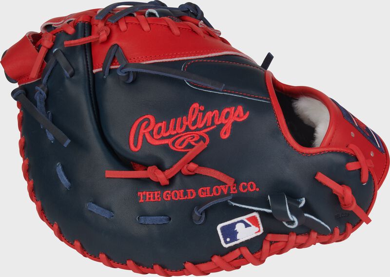 Back of a navy/scarlet Vladimir Guerrero Jr. Pro Preferred 13-Inch 1st Base Mitt with the MLB logo on the pinky loading=