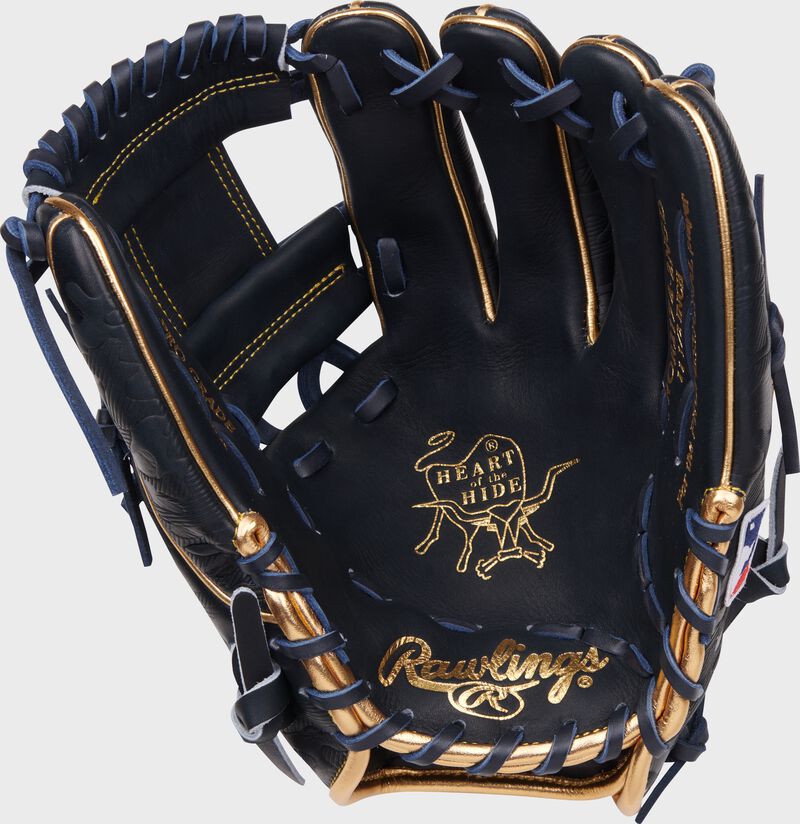 Navy palm of a Rawlings Anthony Volpe Heart of the Hide Infield Glove with gold palm stamping and navy laces
