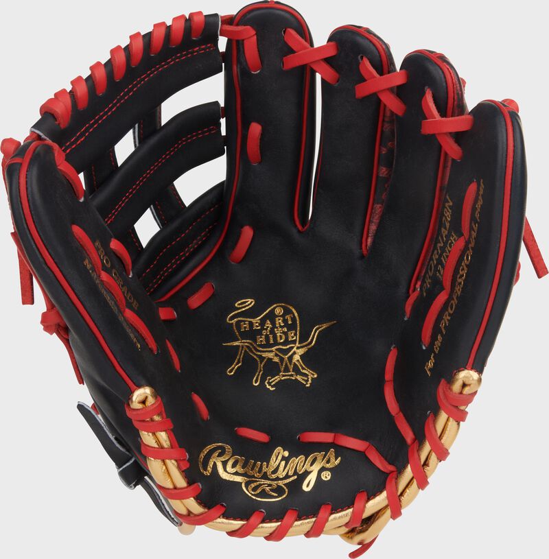 Navy palm of a Nolan Arenado Heart of the Hide 12-Inch Infield Glove with gold stamping and red laces
