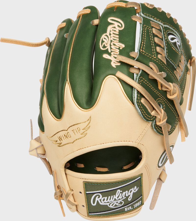 Camel Wing Tip back of a Heart of the Hide R2G 11.75" laced 2-Piece solid web glove with a green Rawlings patch - SKU: RPROR205W-30MGC loading=